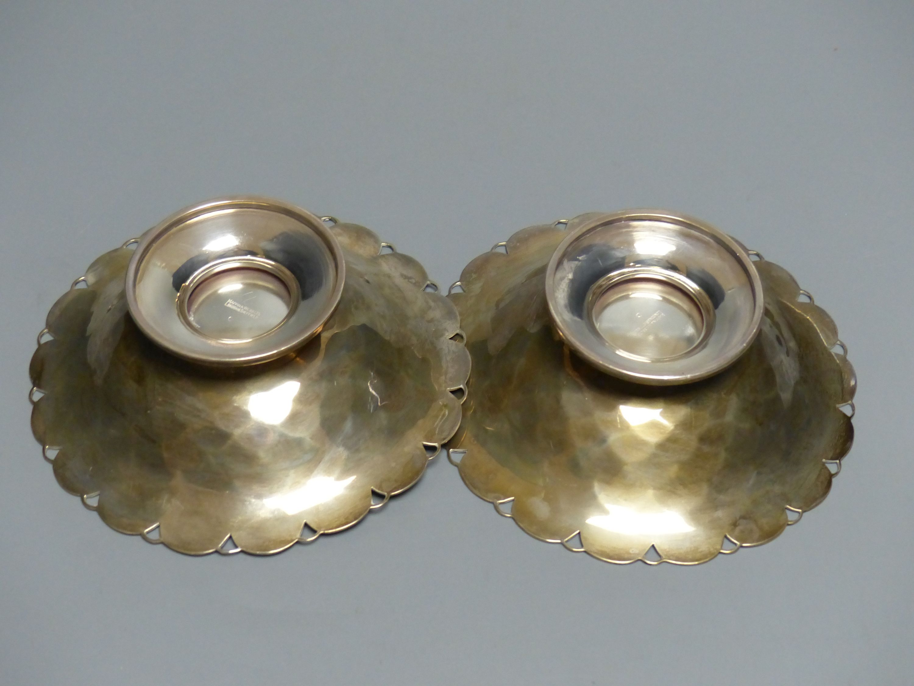 A pair of circular silver sweetmeat tazzas each having scale decoration, shaped rim and circular foot, Sheffield 1957, 15.4cm,